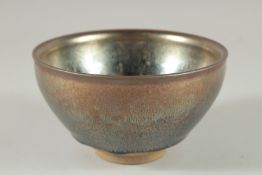 A Chinese hares fur glazed circular pottery bowl. 5ins diameter.