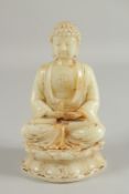 A CELADON HARDSTONE BUDDHA, 20cm high.
