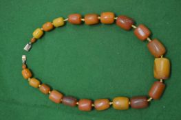 An amber bead necklace, approximately 55grams.