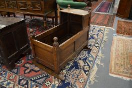 An 18th century oak cradle.