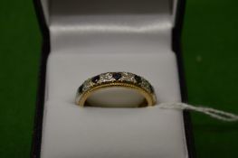 A 9ct gold, diamond and sapphire eternity ring, size Q.
