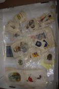 A quantity of silk cigarette cards, unframed.