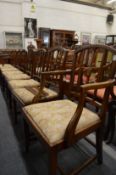 A set of eight Georgian style mahogany dining chairs, two with arms.