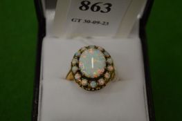A 9ct gold and opal cluster ring, size O.