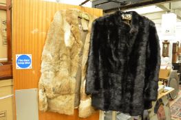 Two fur coats.
