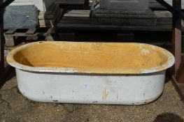 An enamel bath tub.
