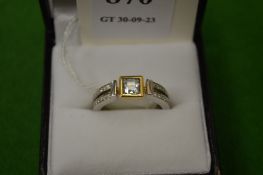 An 18ct white and yellow gold gem set ring, size L½.