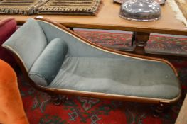 A Victorian mahogany framed chaise longue.