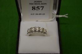 A good 18ct white gold and diamond five stone ring, size O.