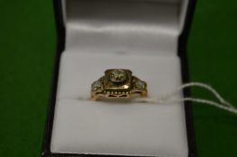 A 9ct gold ring, set with three stones, size I½.