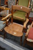 A good Victorian elm seated armchair.