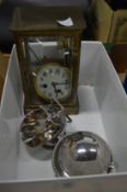 A four glass mantle clock (faults) and other items.