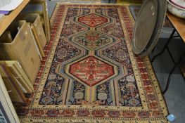 A good Persian rug, blue ground with stylised decoration and various animals and birds, 270cm x