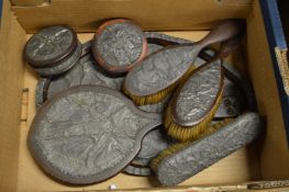 Dressing table set with embossed pewter back.