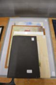 Folder of unframed works of art together with a still life of flowers in a jug and watercolour of