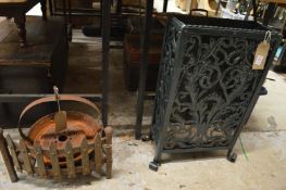 A cast iron stick stand, fire grate etc.