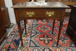 An 18th century oak single drawer side table.
