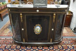 A Victorian inlaid and ormolu mounted ebonised credenza.