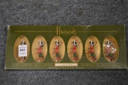 A Harrods box set of six Britains military figures.