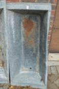 A galvanised trough.