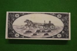 A scrimshaw bone box.