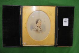 A leather cased miniature/photograph of a lady.