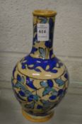 An Iznik style bottle vase.