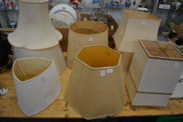 A quantity of lamp shades.