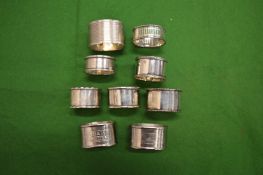 Silver and other napkin rings.