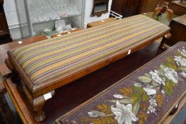 A walnut fender footstool.