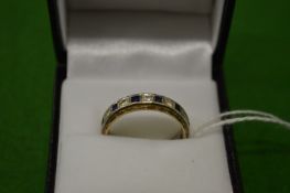A 9ct gold, diamond and sapphire eternity ring, size Q.