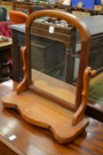 A Victorian mahogany toilet mirror.