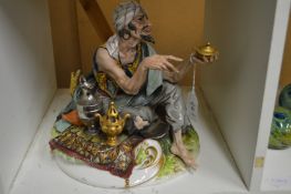 A Capodimonte figure of an Arab street vendor.