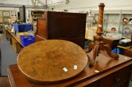 A Victorian figured walnut tripod table.