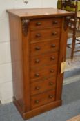 A Victorian walnut Wellington chest.