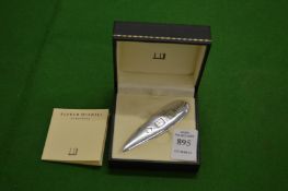 A Dunhill silver letter opener with original box.