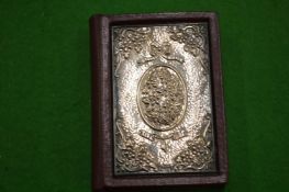 A silver mounted leather miniature dictionary.