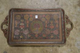 An Eastern enamel decorated and engraved brass rectangular twin handle tray.