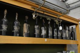 Crofts vintage port 1955, twelve bottles (one bottle lacking contents the others in various states