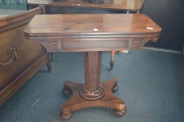 A 19th century mahogany fold-over D shaped card table.