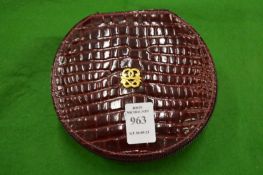 An embossed leather jewellery case.
