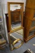 Three gilt wood mirrors and another mirror.