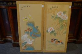 A pair of painted Chinese screens.