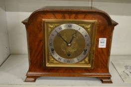 An Elliott walnut cased mantle clock.