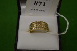 An 18ct gold and diamond four band ring, size N½.