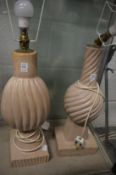 Two large heavy composite lamp bases.