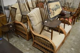 A three piece conservatory suite comprising two seater settee and pair of armchairs.