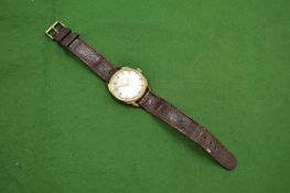 A Gentleman's Paris automatic wristwatch with leather strap.