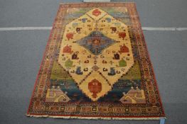 A modern Persian style rug, cream ground with stylised decoration, 285cm x 185cm.