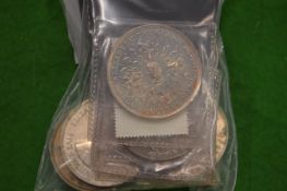 A quantity of Churchill and Elizabeth II crowns.
